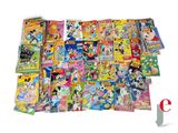 a lot of cartoon books on the table together