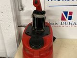 an image of a red fire hydrant sitting on top of a table