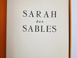 an open book in a box with the title sarah des sables