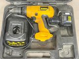 a tool in a case that is open on the table