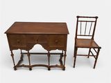 two pieces of furniture including a desk, chair, and sideboard