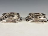 pair of antique silver plated candlestick holders