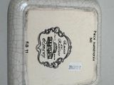 a picture of a picture of a white plate with a label on it
