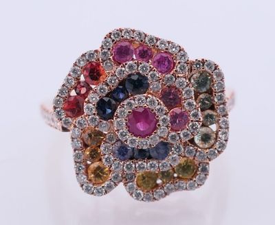Belle bague Cocktail en or rose stylisant une fleur 750°/.(1…
