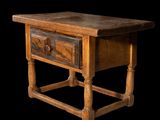 a small wooden table with a drawer on top of it