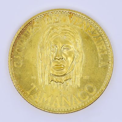 an image of a gold coin with a woman ' s face on it
