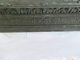 a close up picture of a black vase on a table