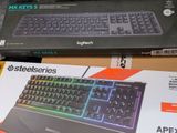 two boxes with a keyboard and a mouse on top of them