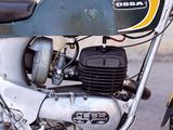 a motorcycle that is parked on the side of the street