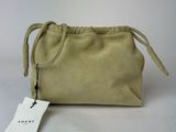 an image of a small beige bag with a tag on it