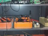 a shelf with many different types of electronics on it