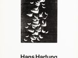 a black and white poster with birds flying in the sky