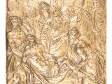 une plaque en or représentant la Nativité de Jésus et de Marie