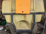 a large yellow cart sitting in the middle of a room