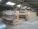 une machine qui fonctionne sur une feuille de papier