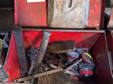 a red tool box with tools inside of it