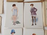 a lot of cards on the table with pictures on them