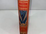 an old book with a picture of a boat in the water