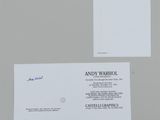a picture of a business card with a picture of andy warhol on it