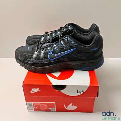 a box with a pair of shoes on top of it