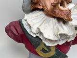 a figurine of a man with a beard and a hat