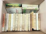 a box full of books that are sitting on a table