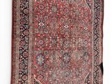 an antique persian rug on a white background