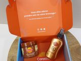 une boîte contenant de nombreux produits, posée sur une table