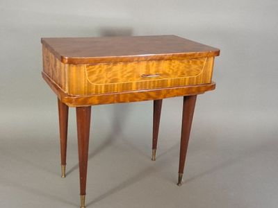 an image of a small wooden table with a drawer on it