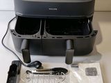 a printer that is sitting on a table next to other items