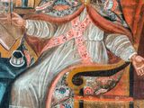 an image of a painting of a man sitting in a chair reading a book