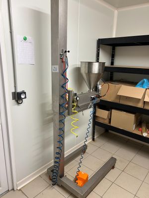 a machine that is sitting on a stand in a room