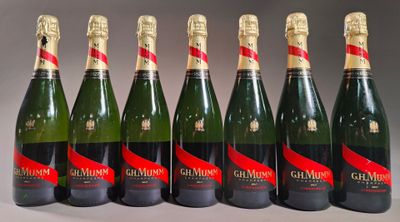 six bottles of champagne are lined up in a row