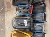 a lot of wires that are sitting on the floor
