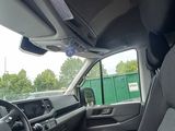 a view of the inside of a vehicle from the driver ' s seat