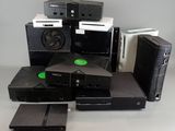 a lot of electronic equipment that are sitting on a table