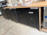 a refrigerator and a refrigerator freezer sitting on a counter