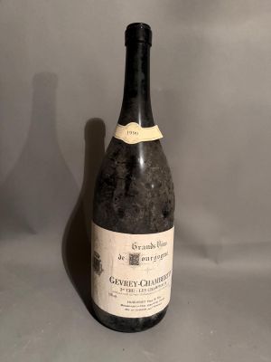 a bottle of wine that is sitting on a table
