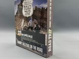 Le coffret DVD « Road Trip » est posé sur une surface blanche