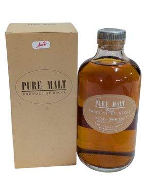 the bottle of pure malt is next to a cardboard box