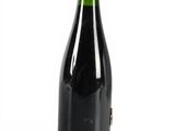 a bottle of wine that is sitting on a table