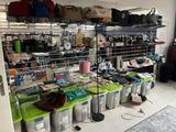 a room with a lot of bags and bags on the shelves