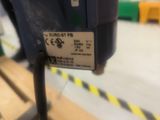 a picture of a parking meter in a warehouse