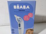 a box with a baby in it sitting on a table