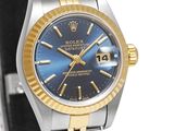 rolex lady ' s watch with blue dial and yellow gold bezel