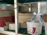a bucket of food sitting on a shelf in a room