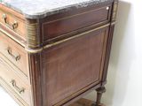 a marble top chest of drawers on a wooden stand