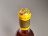 a bottle of wine that is sitting on a table