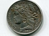 une vieille pièce d'argent avec un visage de femme dessus