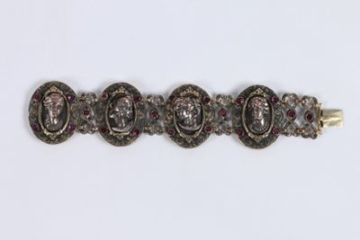 Bracelet en bronze doré à décor de profils de femmes et sert… - Photo 1